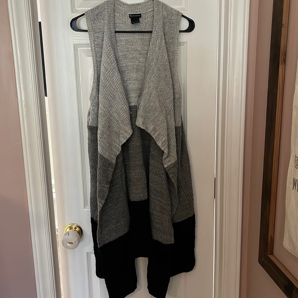Long sleeveless sweater